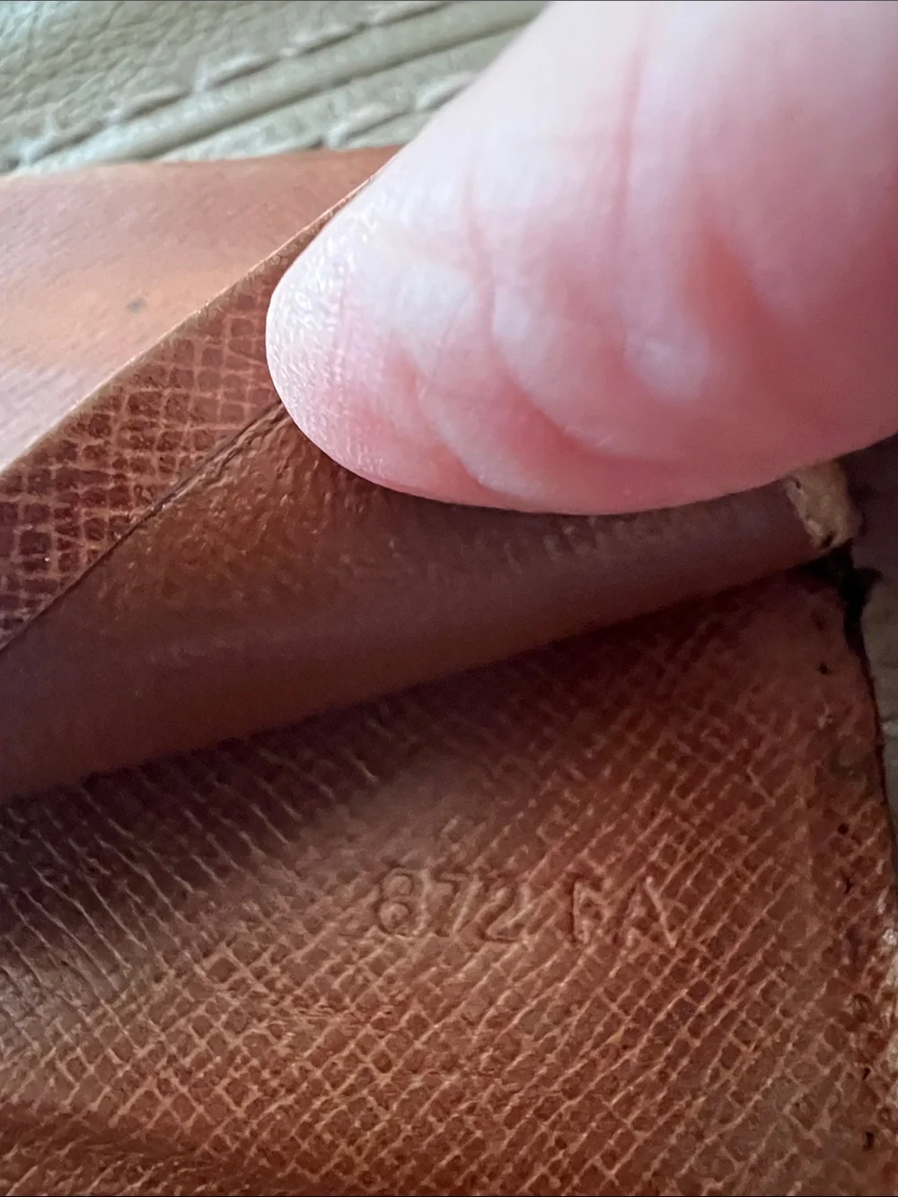 Louis Vuitton Monogram bifold wallet in Brown and Tan
